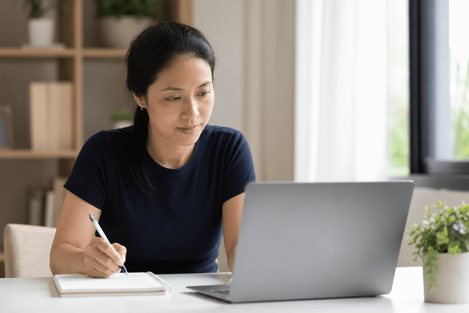 An adult practicing digital skills at a calm desk